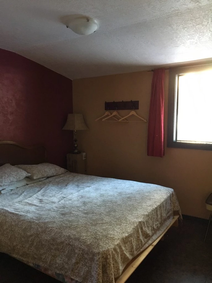 Queen bed bedroom in Hilton cabin
